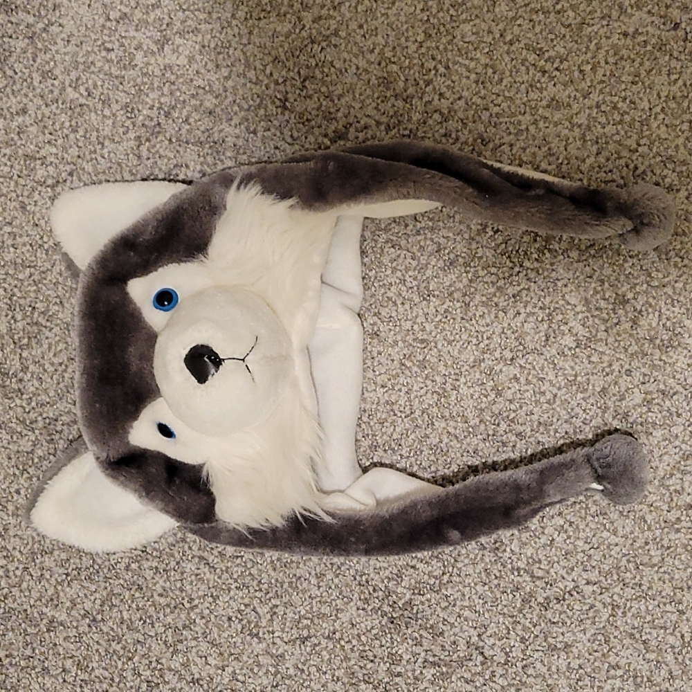Plush husky hat with dangling arms